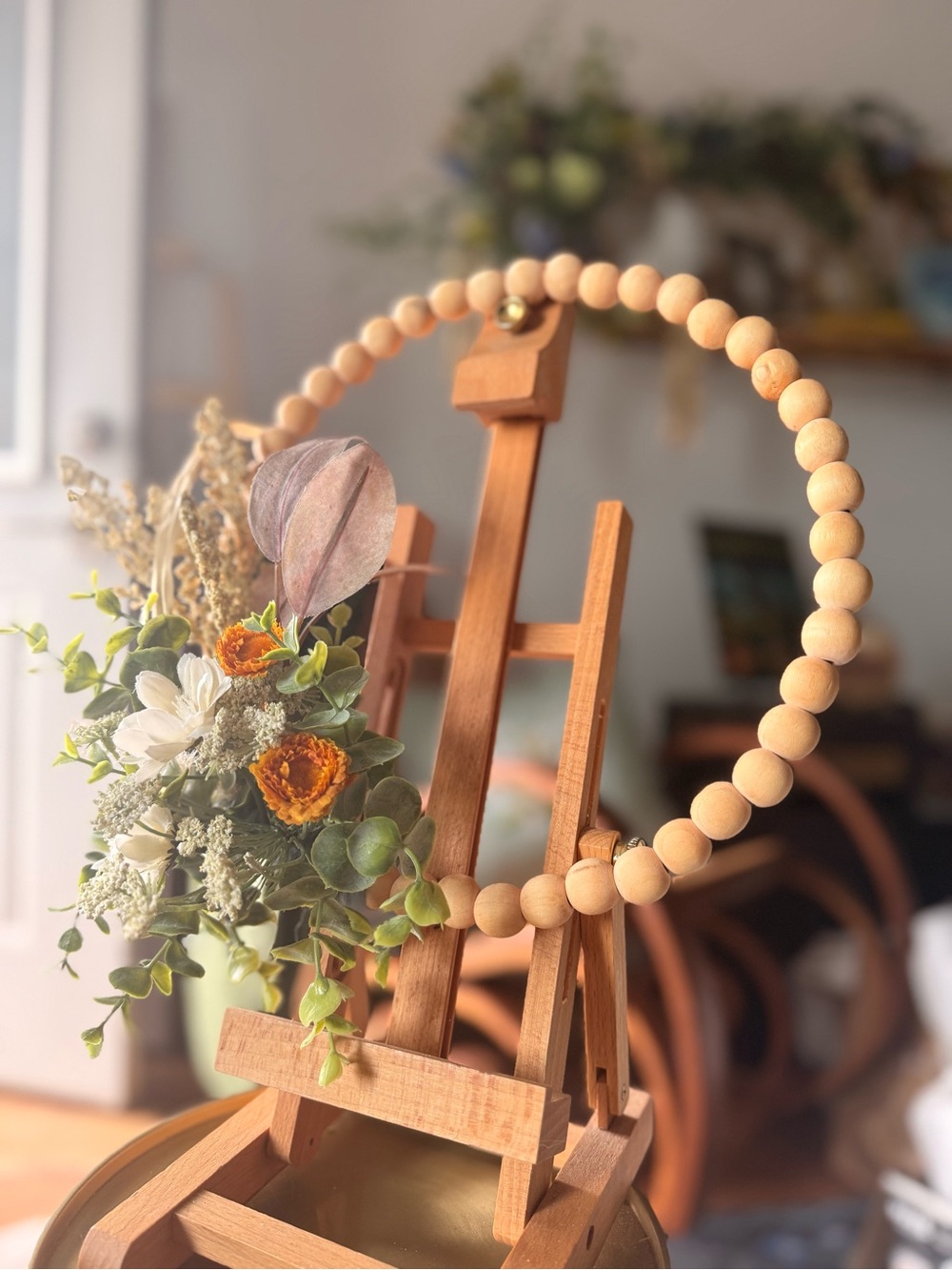 Neutral Wood Bead Wreath with Faux Dried Flower Accent